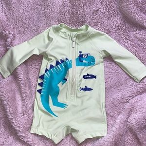 NEVER WORN BODY SWIMSUIT